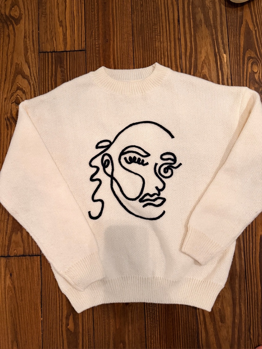 Cream Sweater with Black Line Art Face